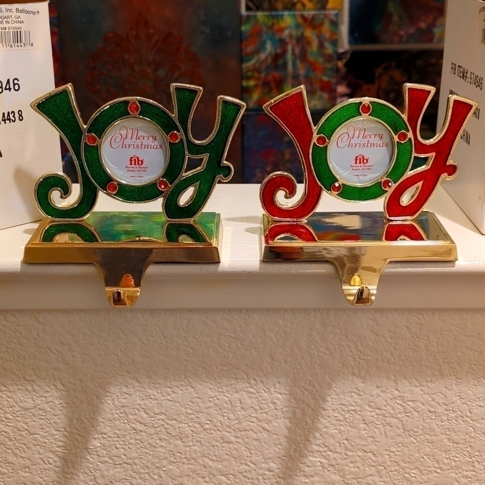 Bnib Joy stocking holder in red and green with weighted gold base and hook.